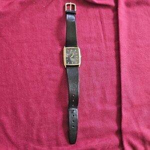 Men's Timex watch, black leather band, new battery